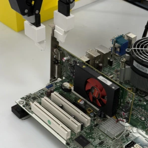 B. Near-miss trace, GPU bracket: the gripper stops just short of the target (orange arrow).