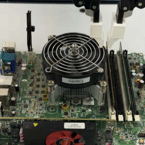 C. Wrong-location trace, CPU fan: the gripper settles beside the target (orange arrow).