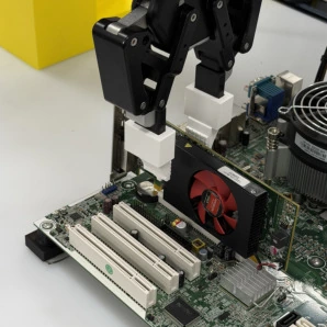 C. Wrong-location trace, GPU bracket: the gripper settles beside the target (orange arrow).